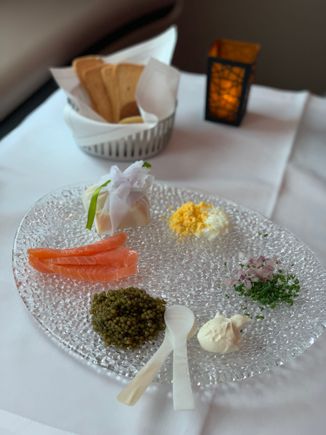 Caviar with smoked salmon. Taste of caviar was excellent. But the amount of condiments is disproportionately meagre - I finished the sour cream, chopped onions/chive and egg yolk/white with just 3 blinis. Again provided feedback to crew, who said they were all prepacked by the caterer, and many passengers indeed had complained that the condiments need to be increased to complement the quantity of caviar provided. 