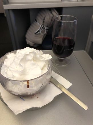 Caramel gelato with choice of hot fudge and/or whipped cream.  Same flight last year was just lemon sorbet