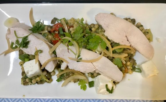 Lemon and thyme chicken breast with feta, couscous, lentils and pesto 