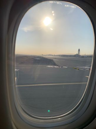 Look toward the control tower. 