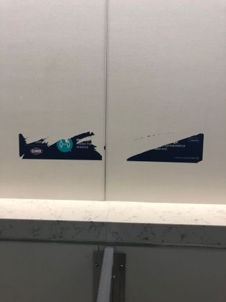 
Before I headed to my gate I made a pit stop in the clubs bathroom. Really you can’t remove the entire sign? I see this in all my travels- a weird reminder. 
