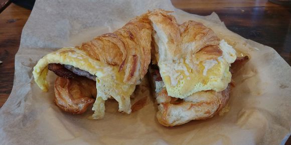 Bacon, sausage, cheese, and egg croissant, Magee’s. 