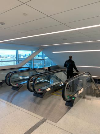 Second set of escalators down to gates