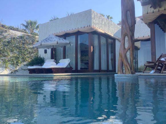 In pool looking to sun terrace and master bedroom