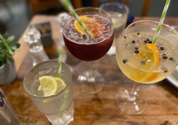 Water with lemon slices , cherry something & ginger lemonade 