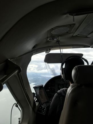 Over the pilot’s shoulder.