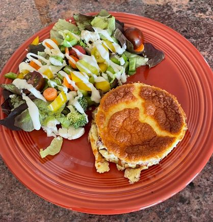 Reheated leftover ham and smoked Gouda soufflé with a salad for lunch. 