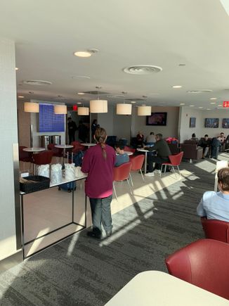 Additional 20-25 seats behind me. Also has toilets to the left of me in this photo