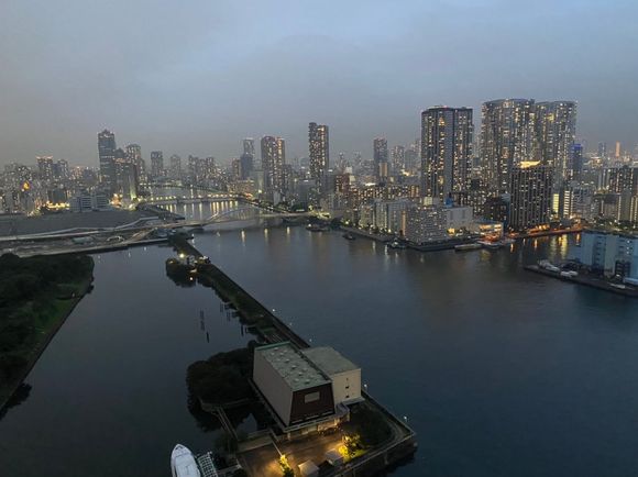 Twilight from lounge balcony looking up Sumida river 