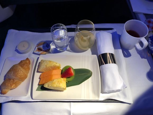 breakfast fruit  and croissant.  skipped yogurt/cereal course.