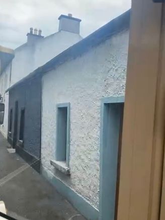 The tour goes down some very narrow streets, where these row houses front. 