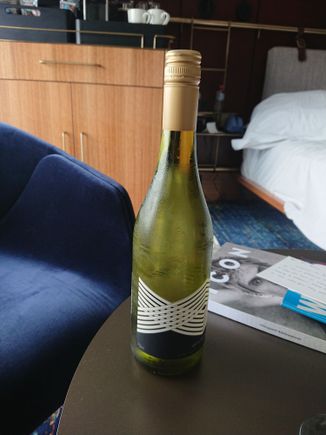 The amenity wine to go with the cheese. Yes,it was a full size bottle .