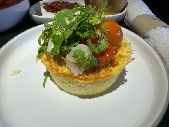 Frittata - roasted cherry tomatoes, herb & parmigiano salad.  Good with the chili oil provided.

