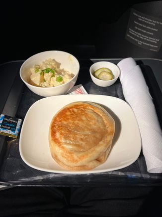 Mid-flight snack: Bao bun with curry potato salad.