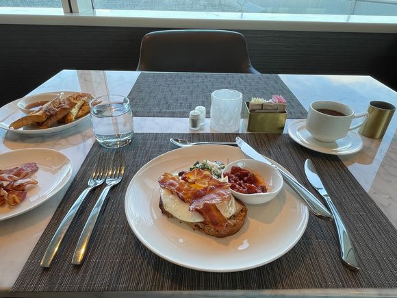 Breakfast in the lounge couple hours prior to flight.