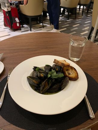 Steamed PEI Mussels with Thai green curry reduction - my favorite first course so far 