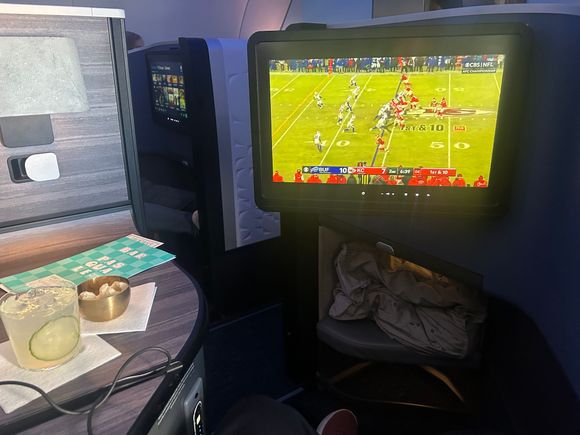 Mahomes vs Allen from 36k ft.  The 17" screen is outstanding, along with the memory foam like seat and all the other bells and whistles in the suite.