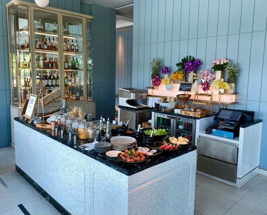 various items on small breakfast buffet at favola