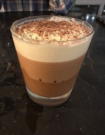 Just got home from Lisbon. Certainly my favorite dessert of the trip and very high on my all-time list was this “Trio de Chocolate” at a restaurant called Quintal das Docas. It’s dark, milk and white chocolate mousses layered, with shaved chocolate on top. 