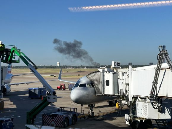 DFW Airport Fire Department conducting training at the fire training center on the southwest side of the airfield. 
