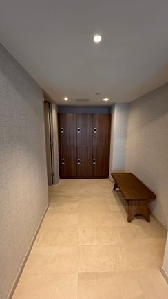 Locker space with one shower.