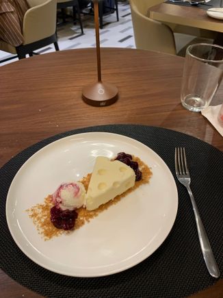 NY cheesecake with cherry compote and ice cream