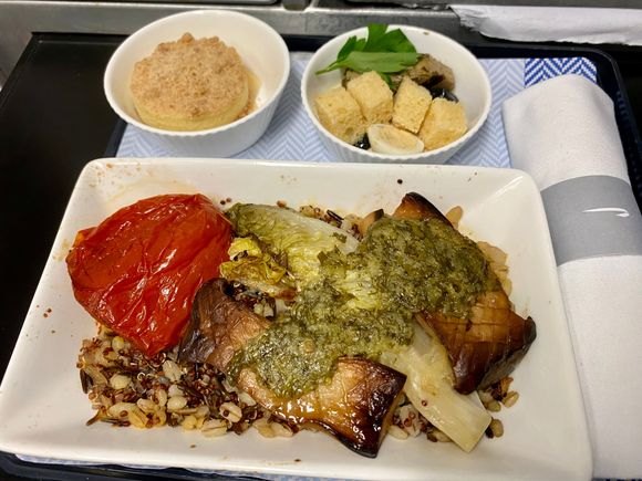 Braised king oyster mushroom with ancient grains, grilled little gem, slow roast balsamic Roma tomato, salsa verde