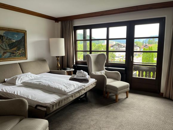 One-Bedroom Suite: Living room with balcony