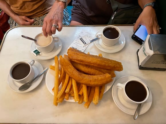 We started this morning with hot chocolate, churros, and porras from Chocolatería San Gines based on SuperG’s recommendation and I believe seconded by @mattp1987. 

The entourage thanks you, it was a great breakfast.  