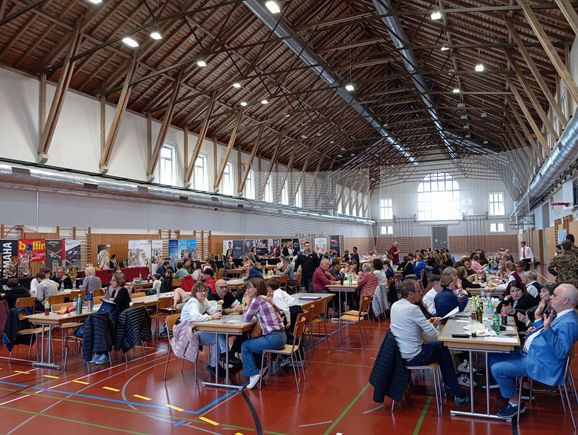 The sports hall in the military barracks in Bern was turned into a refectory where we had meals