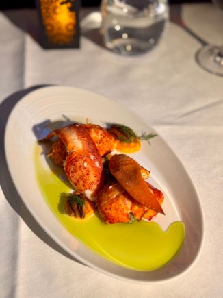 Lunch - Butter poached lobster with walnut tapenade toasted pecans, carrot and vanilla mousseline.

Generous portion of lobster and not rubbery at all 9/10