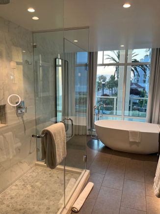 Suite bathroom (the windows are neat but anyone could easily see in, so in general the curtains need to be drawn)