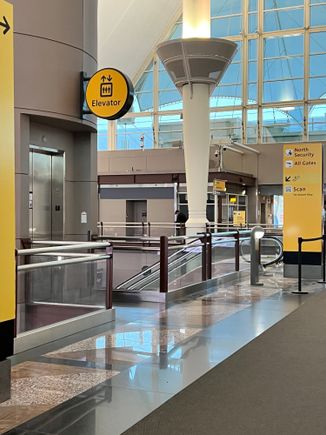 Take the west<->east walkway from Premier check-in opening on 11/10 and then the escalator or elevator down to TSA PreCheck at the North Checkpoint.