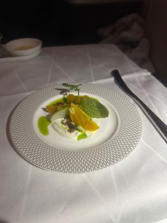 Amuse bouche of goat cheese and beets. 