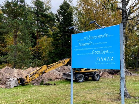 A good bye with a digger in background. There was a lot of those around for some reason.