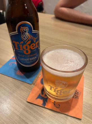 Comically small beer glass