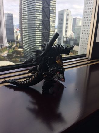 Godzilla-like creature surveying Shinjuku