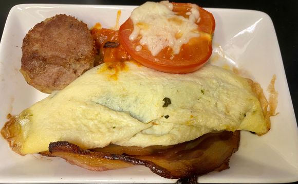Feta and spinach omelette, bacon, corned beef hash, bacon 