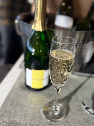A step up from JFK Delta One champagne 