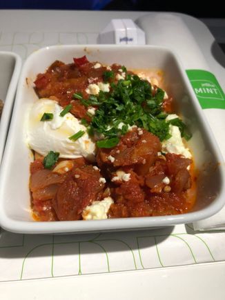 Eggplant Shakshuka - poached egg, feta, herbs. Please don't bother serving a poached egg if the yolk is going to be hard-cooked.  :-(