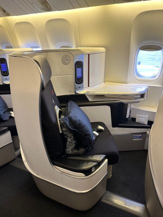 Business on the 77W, just as nice and I felt it was a bit wider in the footwell area. 