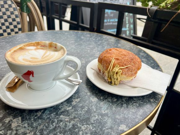 Coffee and a pistachio doughnut from A.Blikle