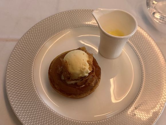Tarte tatin was very good, but ice cream was low quality and icy, and the tiny amount of custard sauce was overheated so a bit curdled.