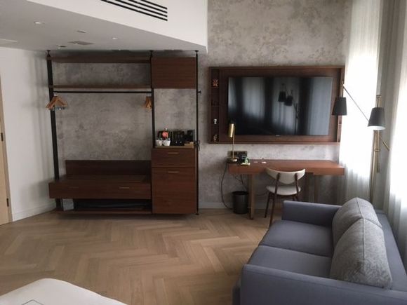 cool open plan wardrobe and wooden flooring