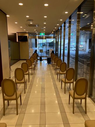 The bus lobby. Bus seats 28, there are 18 chairs here, so if all seats are taken and there's a huge line, assume you won't be getting on the next bus.