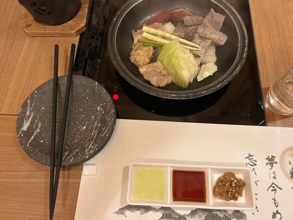 Hida beef, pork, chicken and vegetables cooked on a hot plate while we had the earlier food