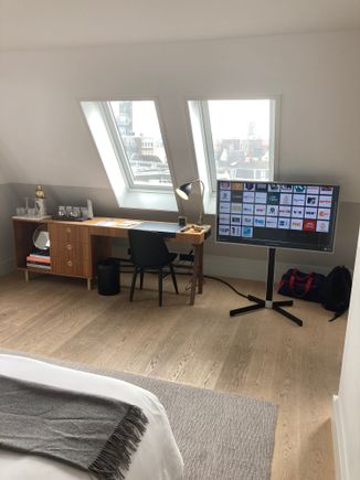 The TV can be turned to face the bedroom or sofa 