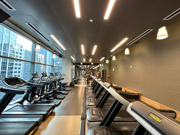 Squat rack all the way at the end and I believe free weights are on the right corner next to rack. 