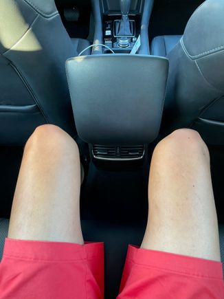 Back seat leg room. I can almost fit my foot behind the central console in the middle seat. On the Passat and Malibu I am able to fit my foot behind the central console.