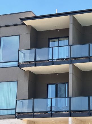 Empty balconies with some rough finish work. 